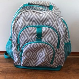 Blue, white, and gray backpack